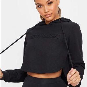PrettyLittleThing black embossed cropped hoodie size small